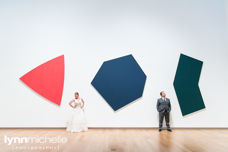 bride and groom in art gallery wedding