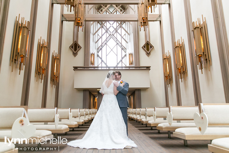 bride and groom in june at marty leonard chapel