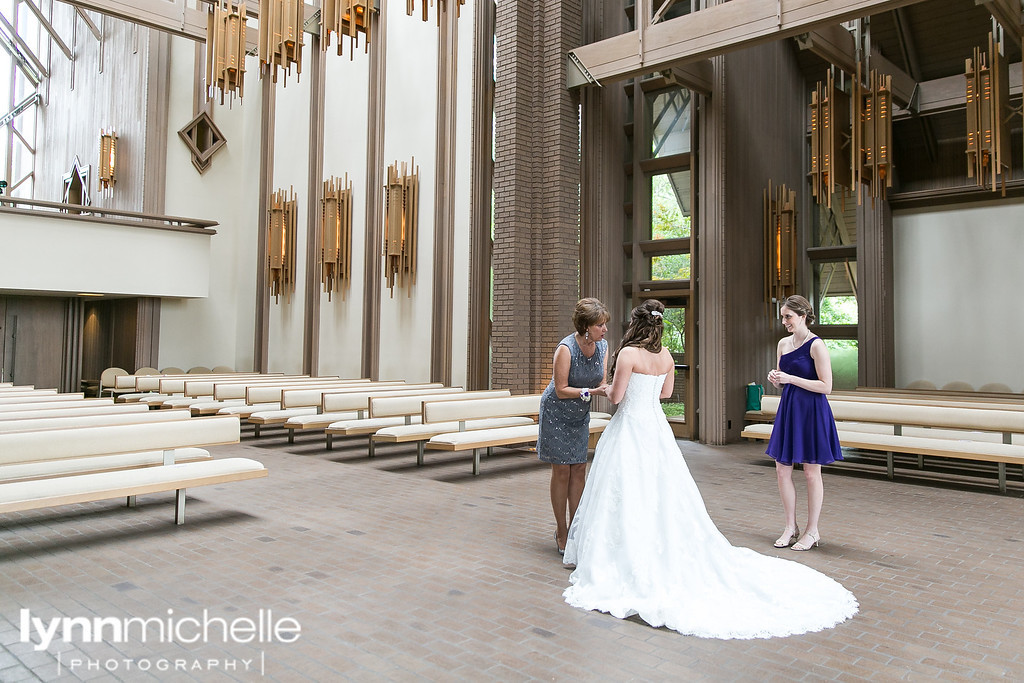 bride and mom moment in chapel