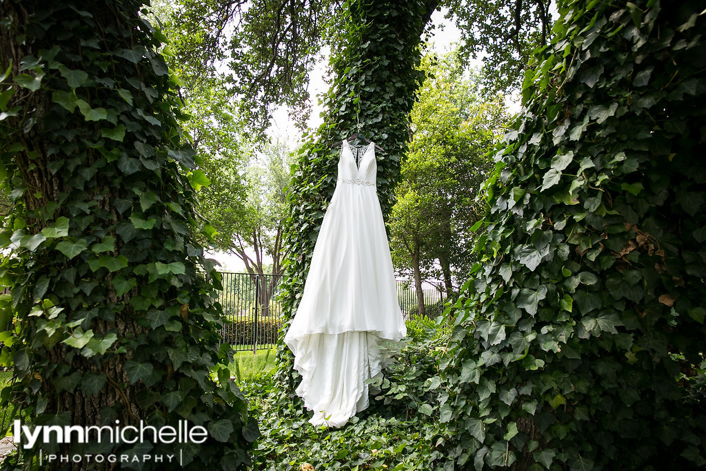 wedding dress in garden stonegate mansion