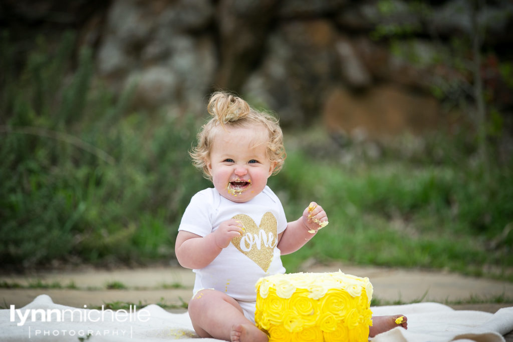 gold and white one year old birthday photography